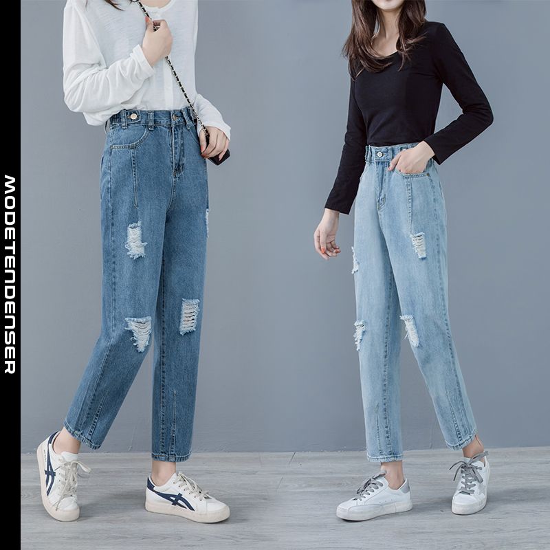 de trendy kvinders jeans er slidte og gamle retroblå